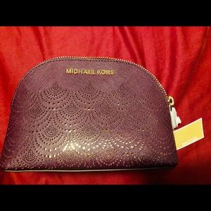 Authentic MK Travel Large pouch Wine/ Gold color